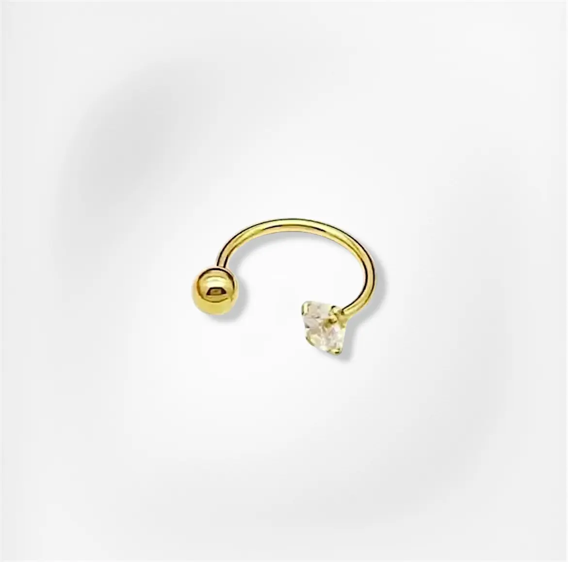 Fer à cheval de nez Samantha en titane doré, motif de pierres claires
